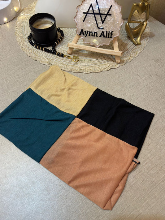 4 in 1 jersey tube band in Dark Green, Skin, Black and Peach by Aynn Alif Pakistan – soft stretchable hijab undercap for secure and polished scarf styling.