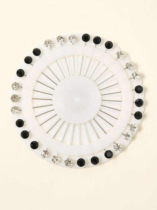 Black and white stones studded hijab pins by Aynn Alif Pakistan with elegant embellished scarf pins for secure hijab styling.
