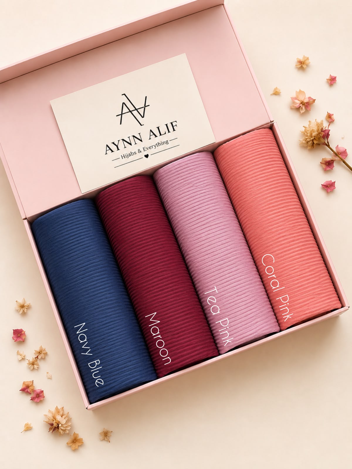 Blush & Berry Ribbed Jersey Hijab Box featuring Navy Blue, Berry Maroon, Soft Lilac Pink and Peach Blush premium anti-slip narrow ribbed jersey hijabs.