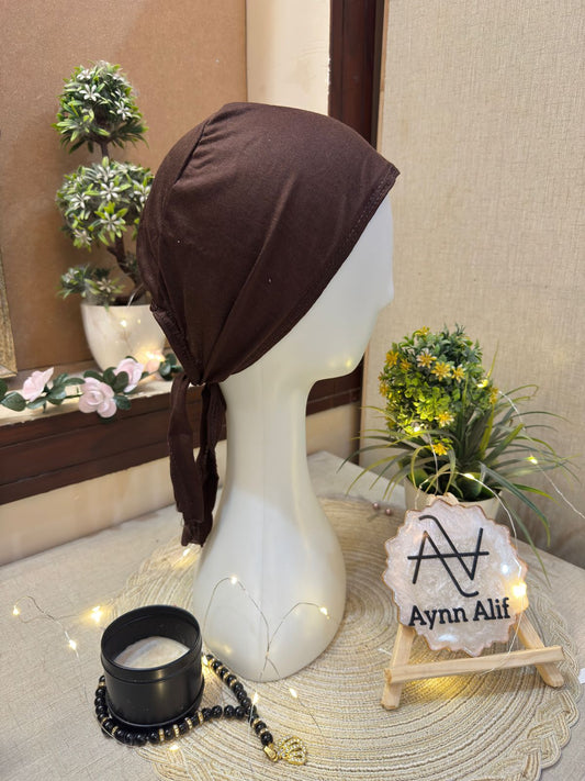 Chocolate brown plain hijab cap on mannequin