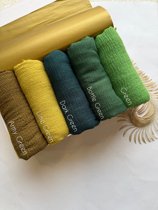 Aynn Alif green crimp lawn hijab collection featuring army green lime green dark green bottle green and green breathable anti slip textured hijabs in Pakistan.