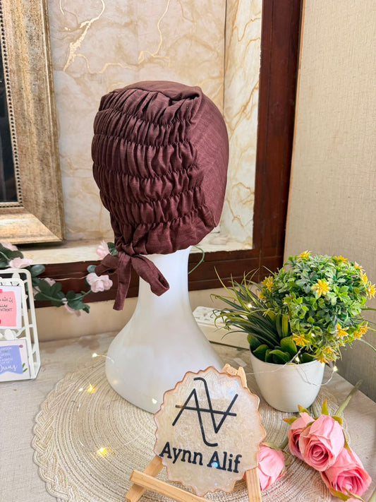 Dark Brown ruched tie back hijab cap made from soft breathable jersey with full head coverage and adjustable tie-back by Aynn Alif.