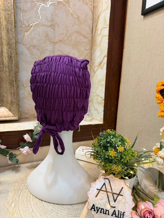 Dark Purple ruched tie back hijab cap made from soft breathable jersey with full head coverage and adjustable tie-back by Aynn Alif.