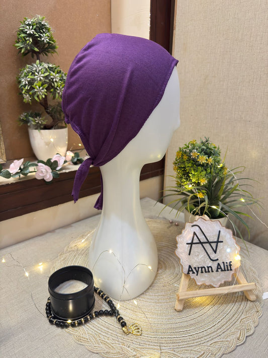Deep purple hijab underscarf cap on mannequin
