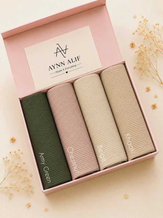 Earthy Elegance Ribbed Jersey Hijab Box featuring Olive Green, Nude Blush, Sand Beige and Warm Beige premium anti-slip narrow ribbed jersey hijabs in a luxury gift box.