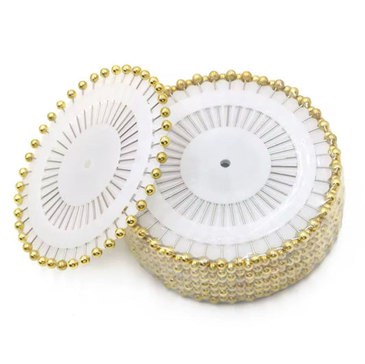 Golden pinwheel hijab pins featuring 30 premium golden scarf pins for elegant hijab looks.