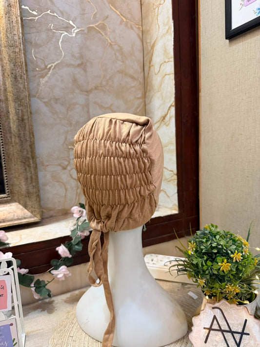 Light Brown ruched tie back hijab cap made from soft breathable jersey with full head coverage and adjustable tie-back by Aynn Alif.