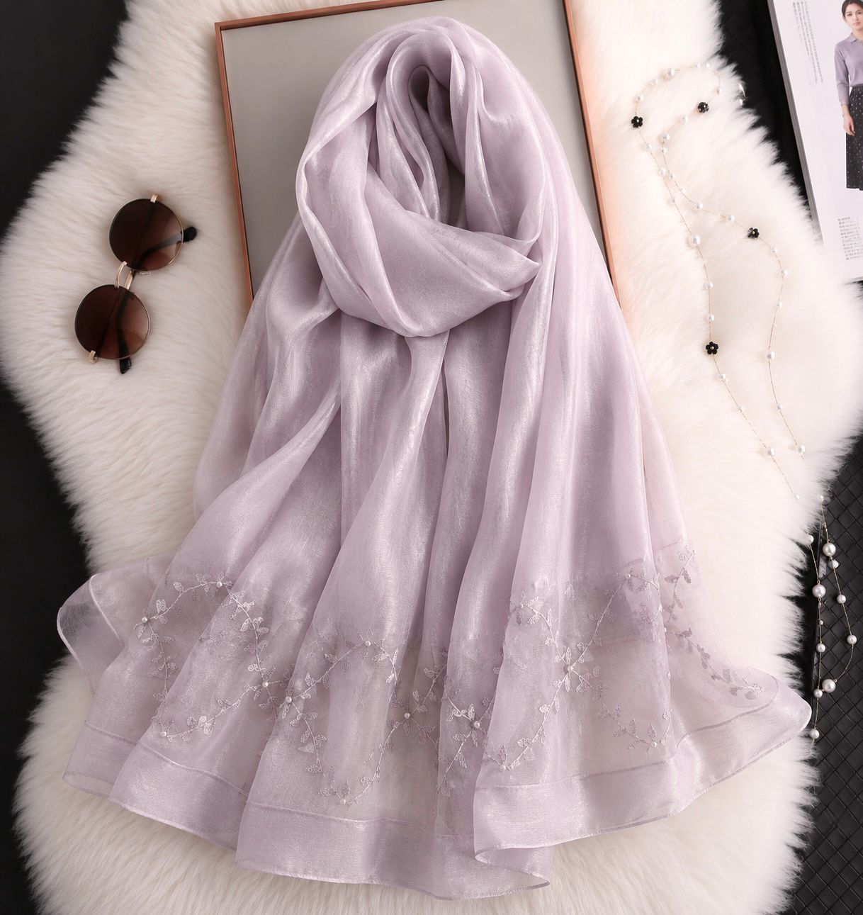 Light lavender cotton silk hijab with embroidered organza border and pearl detailing by Aynn Alif Pakistan.