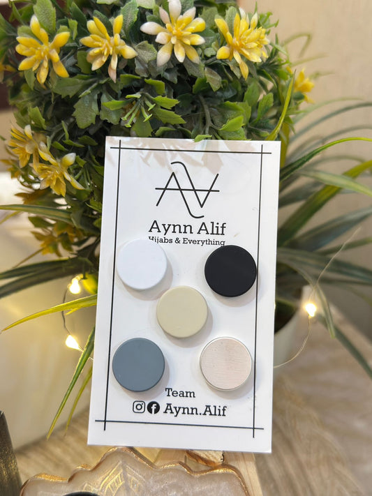 Matte flat hijab magnets in white, black, cream, gray and silver colours by Aynn Alif for modest hijab styling in Pakistan