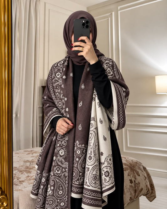 Mocha brown and ivory paisley reversible woolen wrap styled over a black modest outfit