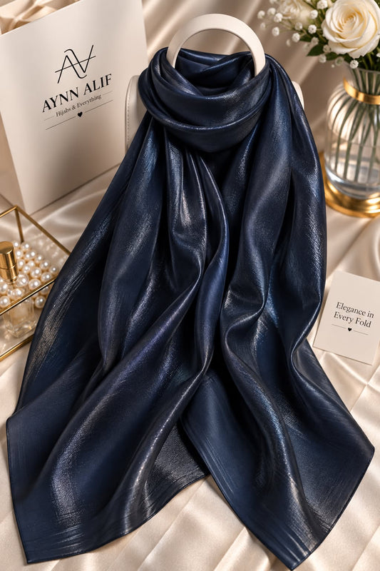 Midnight navy double tone sheen silk scarf with a luminous finish, smooth texture and elegant flowy drape by Aynn Alif.