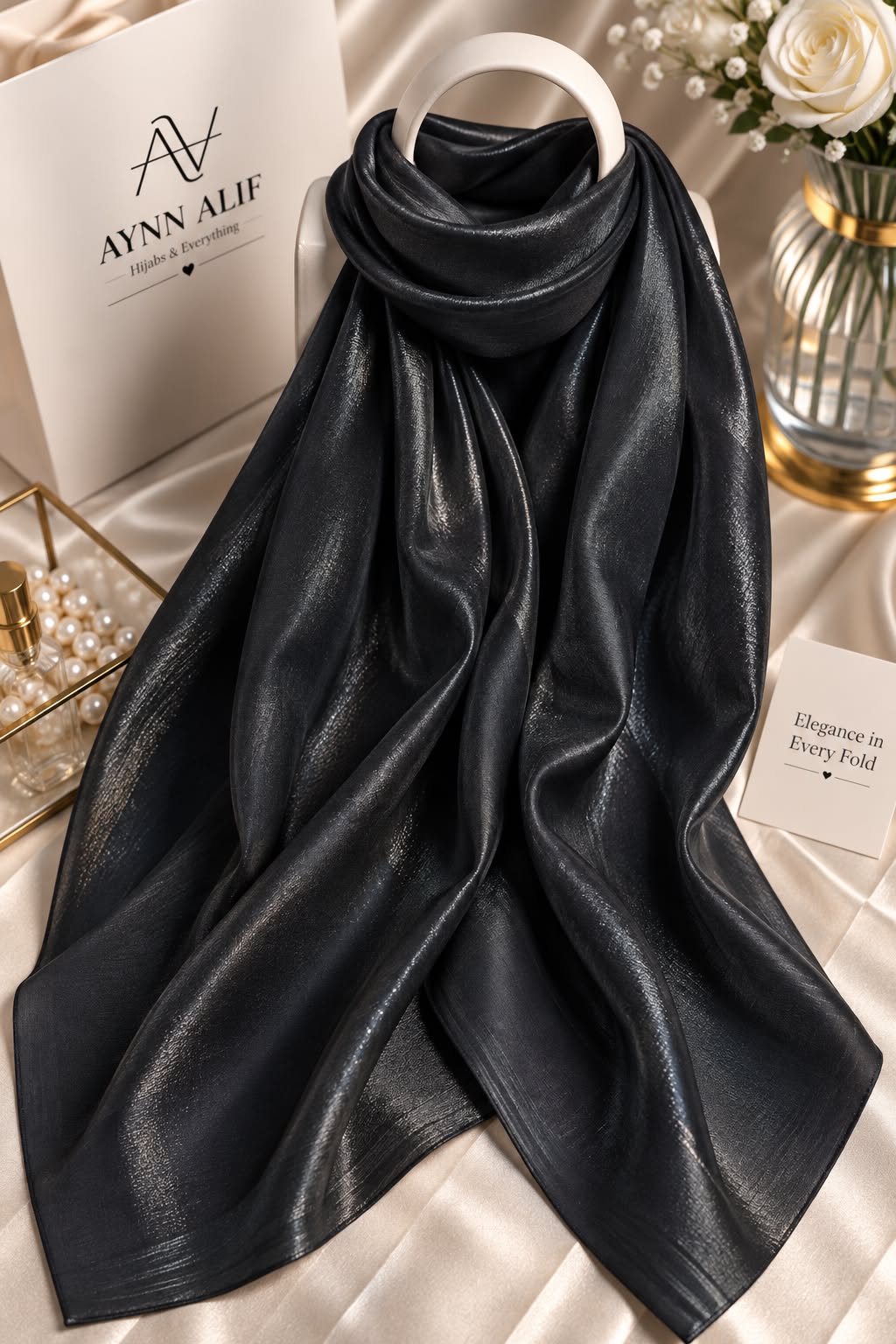 Onyx black double tone sheen silk scarf with subtle tonal sheen, smooth texture and elegant flowy drape by Aynn Alif.