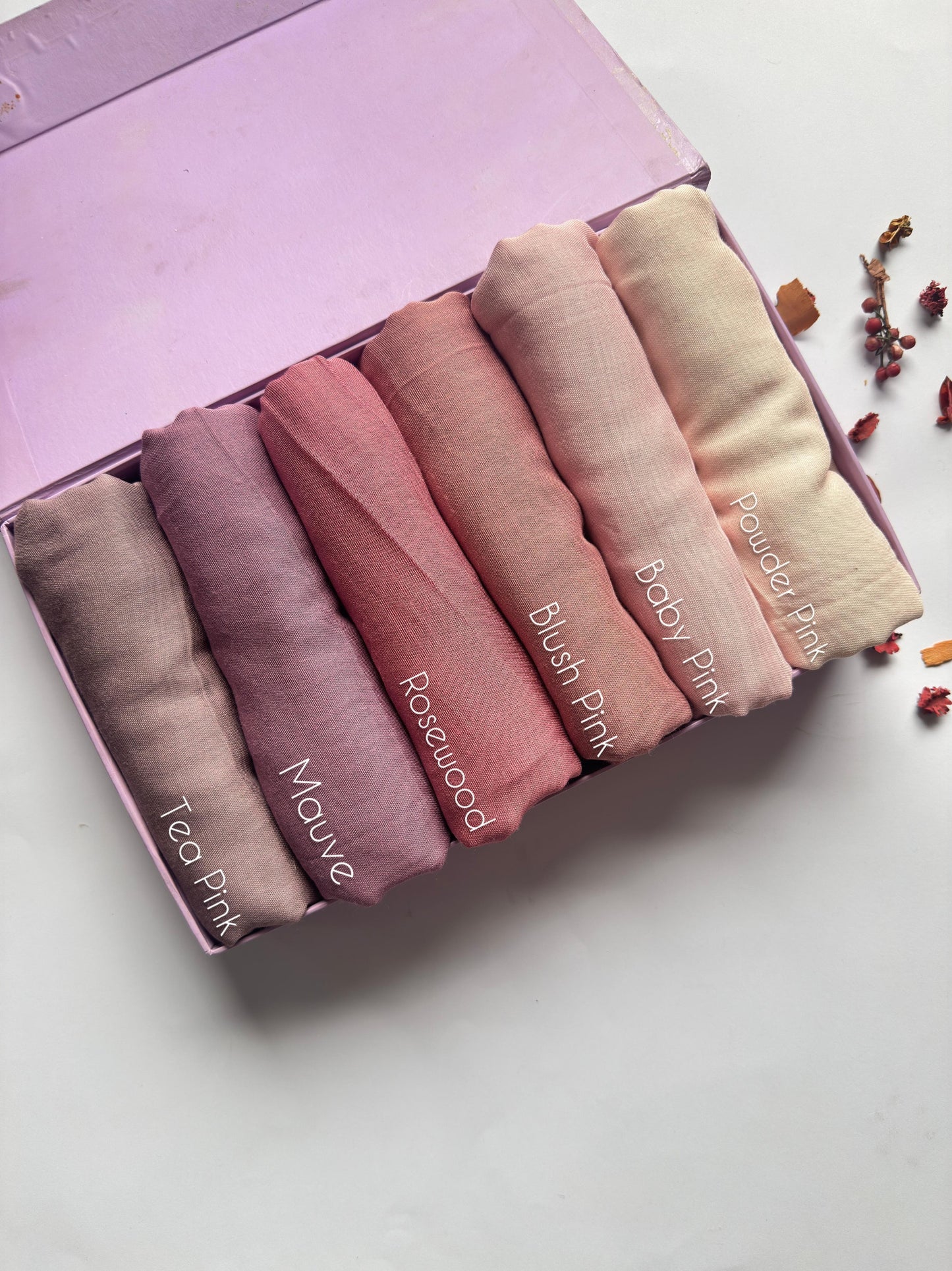 Aynn Alif Plain Modal Lawn Hijab Collection featuring Tea Pink, Mauve, Rosewood, Blush Pink, Baby Pink and Powder Pink shades.