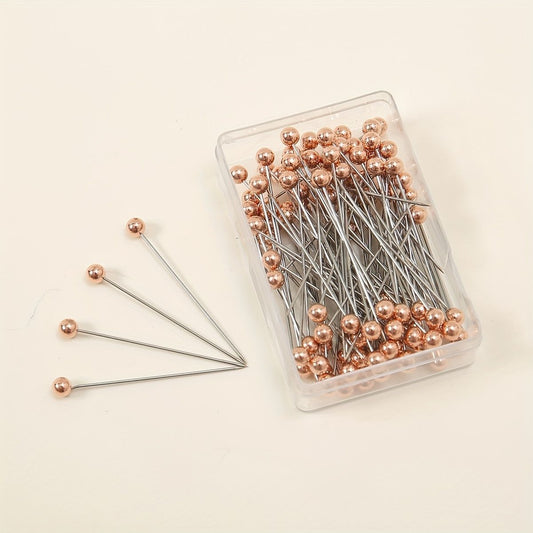 Rose gold hijab pins box of 100 by Aynn Alif Pakistan featuring premium rose gold scarf pins for elegant hijab wear.
