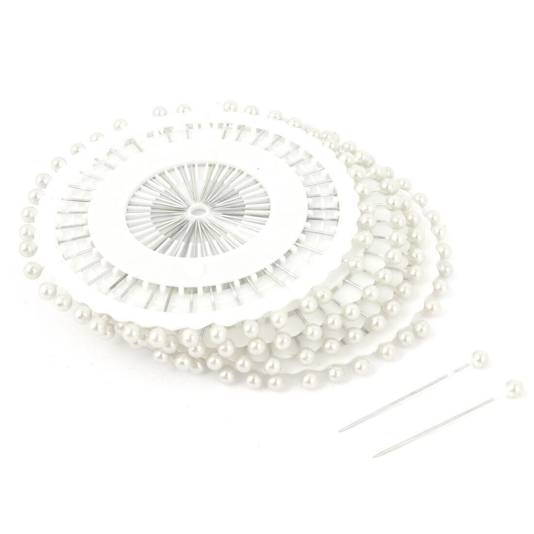 White pinwheel hijab pins by Aynn Alif Pakistan featuring 30 premium white scarf pins for everyday hijab styling.