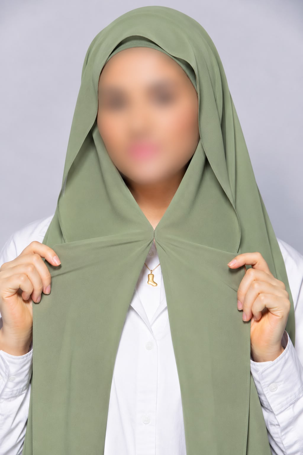 Apple green instant chiffon georgette hijab with attached tube band and built-in magnet for easy and effortless styling.