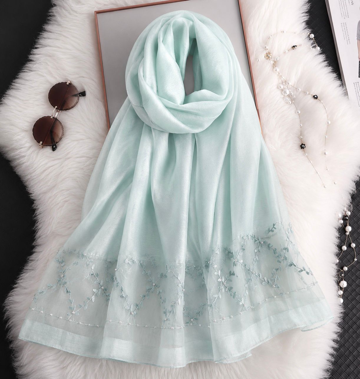 Aqua blue cotton silk hijab with embroidered organza border and pearl detailing.