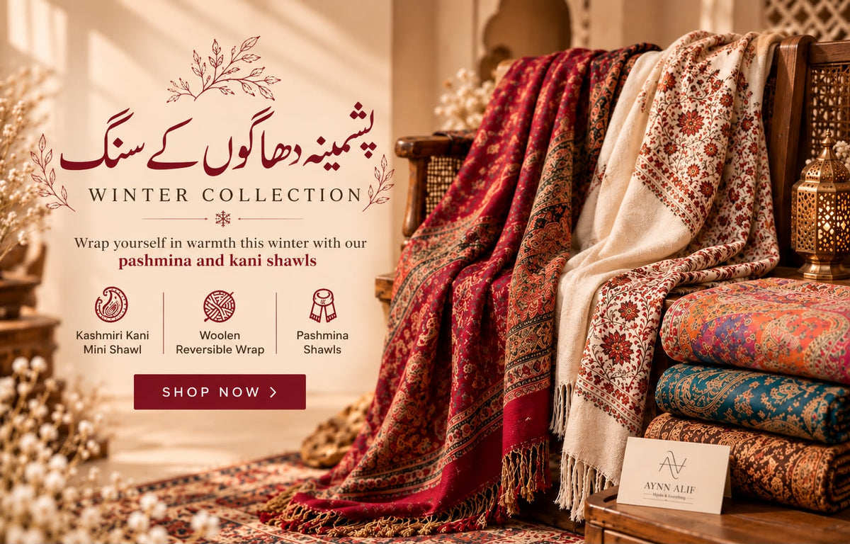 Aynn Alif Winter Collection banner featuring pashmina shawls, Kashmiri Kani mini shawls, and woolen reversible wraps in elegant winter prints, with the Urdu tagline “پشمینہ دھاگوں کے سنگ”.
