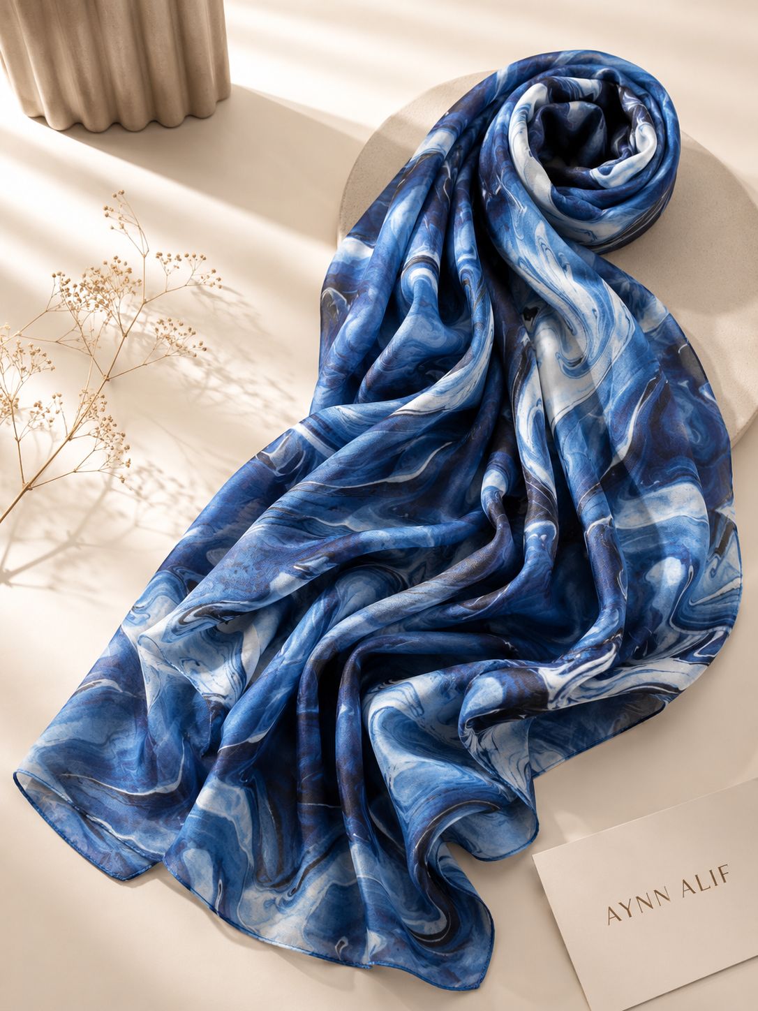 Extra large blue marble printed modal lawn hijab with double-sewn edges, soft breathable fabric, elegant drape and lightweight everyday wear design.