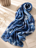 Extra large blue marble printed modal lawn hijab with double-sewn edges, soft breathable fabric, elegant drape and lightweight everyday wear design.