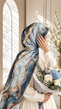 Aynn Alif Azure Marble printed sheen silk hijab in icy blue, navy and gold abstract marble print