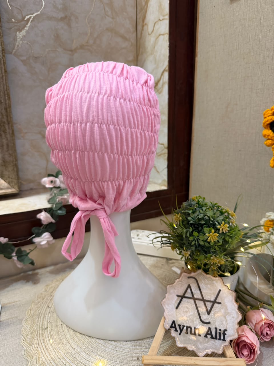 Baby Pink ruched tie back hijab cap made from soft breathable jersey with full head coverage and adjustable tie-back by Aynn Alif.