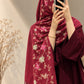 Berry red cashmere embroidered hijab with floral sequin embellishments and fringed edges by Aynn Alif, styled with a maroon abaya.
