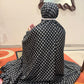 Black namaz chaadar with white rings by Aynn Alif Pakistan featuring elastic sleeves, elastic headband, wudu-friendly design, and full coverage prayer wear for women.