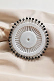 Black pinwheel hijab pins by Aynn Alif Pakistan featuring 30 premium black scarf pins for everyday hijab wear.