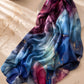 Aynn Alif extra large modal lawn hijab featuring a blue marble print with ruby red tones and elegant gold accents in a soft breathable fabric.