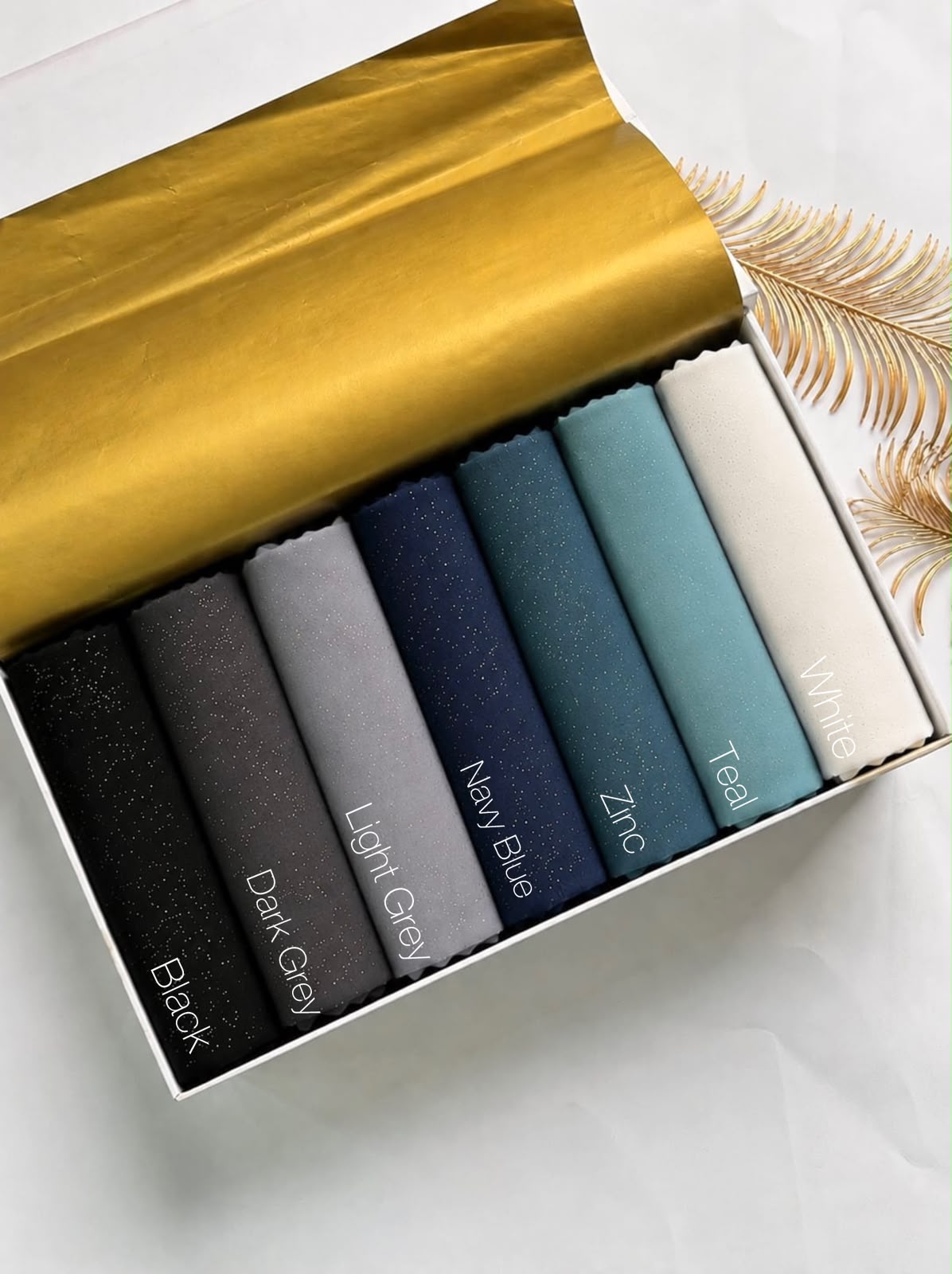 Aynn Alif glitter chiffon georgette hijab collection featuring Black, Dark Grey, Light Grey, Navy Blue, Zinc and White colours in Pakistan.