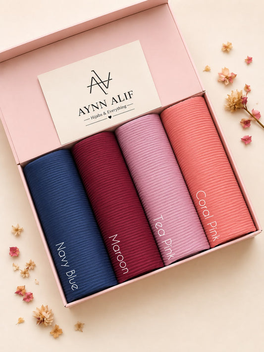 Blush & Berry Ribbed Jersey Hijab Box featuring Navy Blue, Berry Maroon, Soft Lilac Pink and Peach Blush premium anti-slip narrow ribbed jersey hijabs.