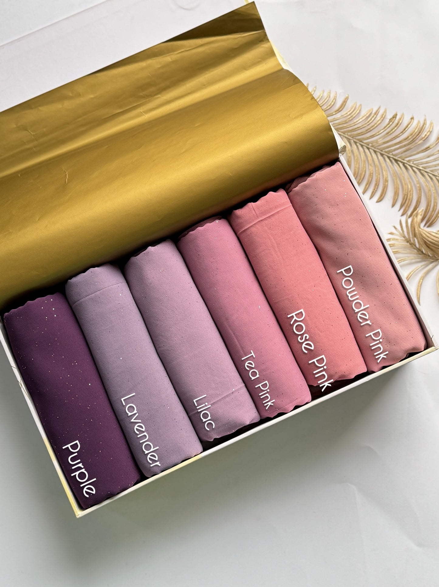 Aynn Alif glitter chiffon georgette hijab collection featuring Purple, Lavender, Lilac, Tea Pink, Rose Pink, and Powder Pink shades in Pakistan.