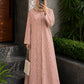 Blush pink floral printed front open abaya in Korean Nidah with straight sleeves and matching scarf, styled in an elegant outdoor setting.