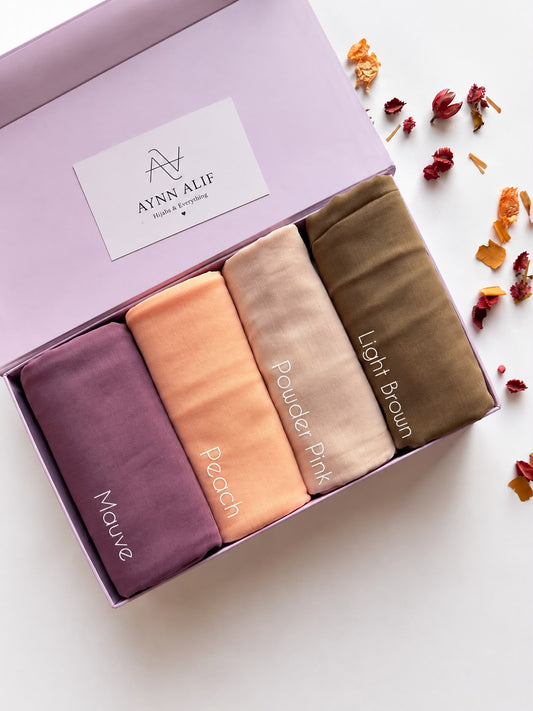 Aynn Alif Blush Harmony Plain Lawn Hijab Box featuring Mauve, Peach, Powder Pink and Light Brown premium breathable lawn hijabs in elegant gift box packaging.
