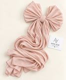 Blush pink stones-studded matte silk hijab with a soft, flowy drape and delicate stone embellishments by Aynn Alif.