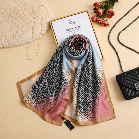 Blush pink, beige, ivory and black printed silk scarf with geometric monogram-inspired pattern by Aynn Alif