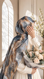 Aynn Alif Champagne Marble printed sheen silk hijab in slate blue, icy grey and charcoal with champagne gold detailing