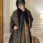 Charcoal black and camel paisley reversible woolen wrap styled over a black modest outfit
