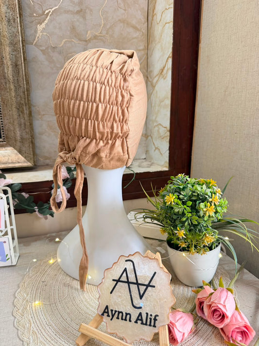 Chestnut ruched tie back hijab cap made from soft breathable jersey with full head coverage and adjustable tie-back by Aynn Alif