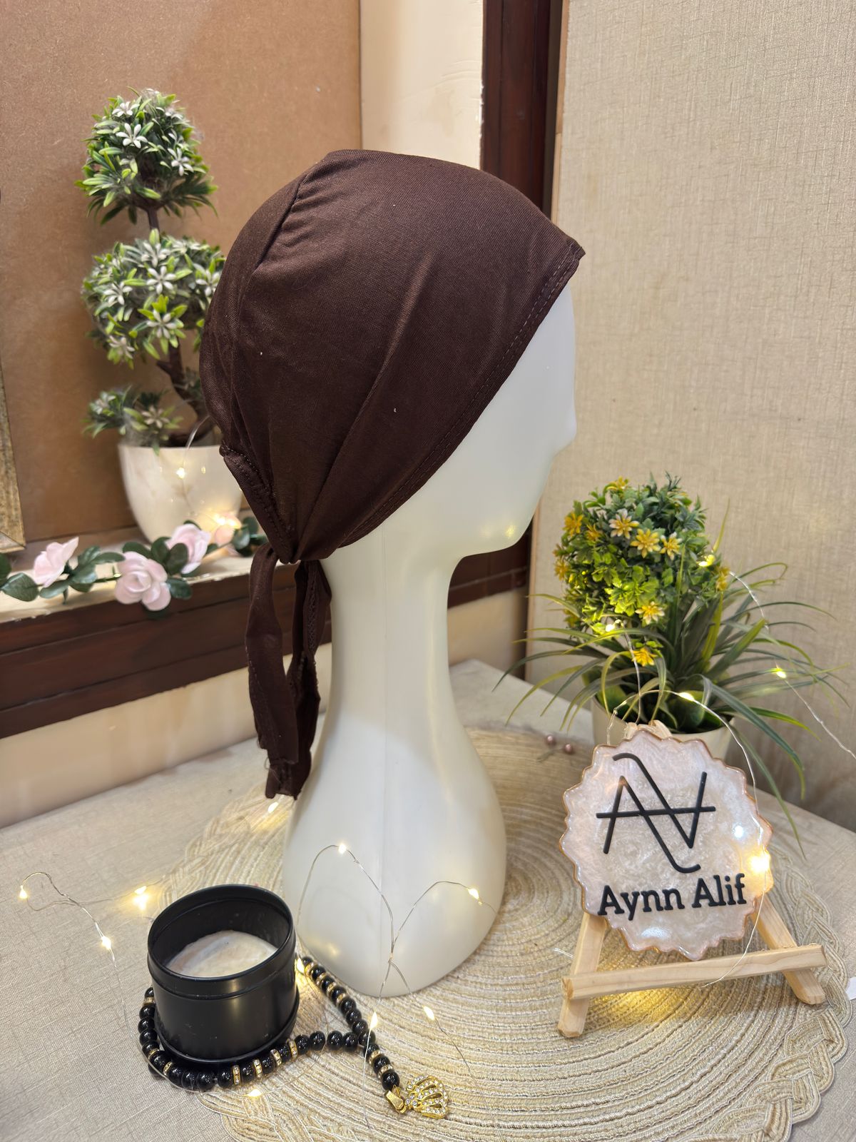 Chocolate brown plain hijab cap on mannequin