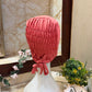 Coral Pink ruched tie back hijab cap made from soft breathable jersey with full head coverage and adjustable tie-back by Aynn Alif.