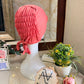 Coral Pink ruched tie back hijab cap made from soft breathable jersey with full head coverage and adjustable tie-back by Aynn Alif.