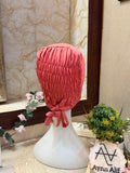 Coral Pink ruched tie back hijab cap made from soft breathable jersey with full head coverage and adjustable tie-back by Aynn Alif.