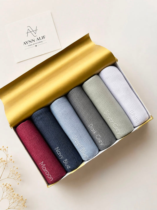 Crimped Moonlight Jersey Hijab by Aynn Alif in Maroon, Navy Blue, Steel Blue, Dark Grey, Silver, and White. Premium soft, breathable, lightweight textured jersey hijab for modest fashion in Pakistan.