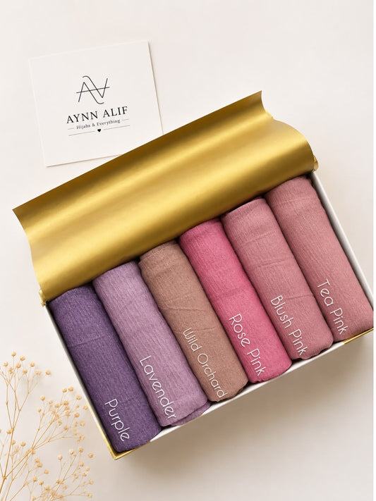 Crimped Moonlight Jersey Hijab Collection by Aynn Alif Pakistan featuring Purple, Lavender, Wild Orchid, Rose Pink, Blush Pink, and Tea Pink shades in soft, breathable, lightweight textured jersey fabric.