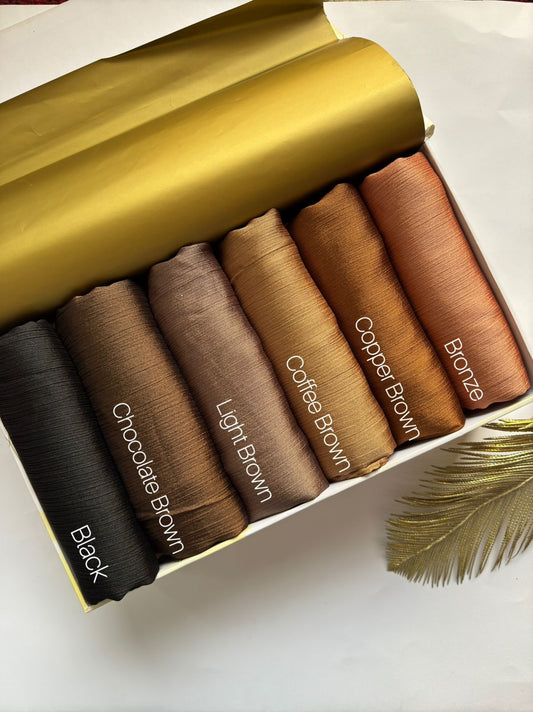 Crinkle Silk Hijab Collection featuring black, chocolate brown, light brown, coffee brown, copper and bronze shades in premium textured silk fabric