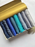 Crinkle Silk Hijab Ocean Mist Collection featuring Navy Blue, Midnight Blue, Royal Blue, Zinc, Peacock Blue, Steel Blue, Dark Grey and Silver shades.