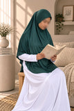 Girl wearing a dark green Aynn Alif teens jersey makhna scarf with adjustable back elastic, designed for a comfortable and secure fit for ages 11–16.
