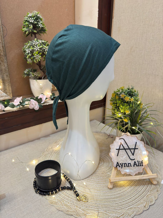 Dark green hijab cap side profile mannequin